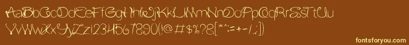 FlowerInTheWindow-fontti – keltaiset fontit ruskealla taustalla