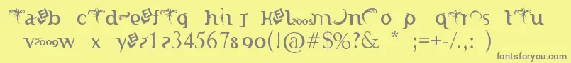 フォントIndonesianaTruetypefontPoweredByFizzLabz – 黄色の背景に灰色の文字