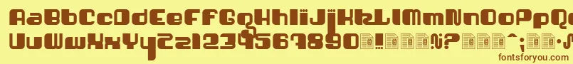 フォントShatner – 茶色の文字が黄色の背景にあります。