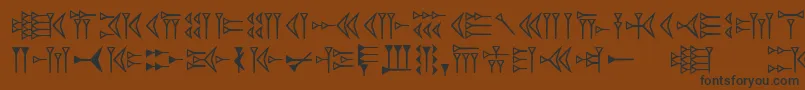 Easycuneiform-Schriftart – Schwarze Schriften auf braunem Hintergrund