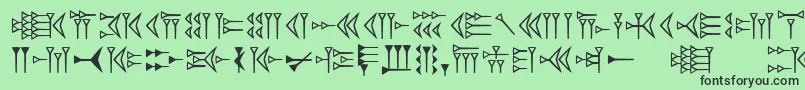 フォントEasycuneiform – 緑の背景に黒い文字