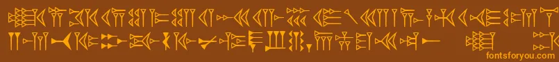 フォントEasycuneiform – オレンジ色の文字が茶色の背景にあります。