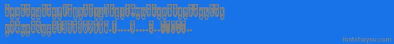 PopuluxeBlub-fontti – harmaat kirjasimet sinisellä taustalla