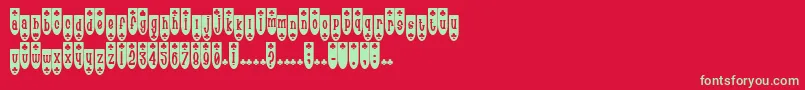 PopuluxeBlub-Schriftart – Grüne Schriften auf rotem Hintergrund