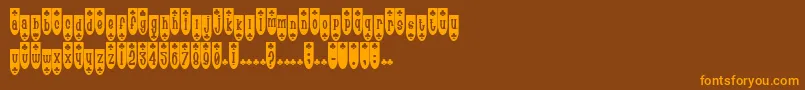 PopuluxeBlub-fontti – oranssit fontit ruskealla taustalla