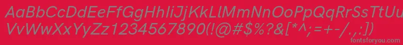 HkgroteskMediumlegacyitalic-Schriftart – Graue Schriften auf rotem Hintergrund