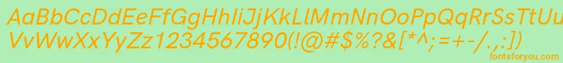 Шрифт HkgroteskMediumlegacyitalic – оранжевые шрифты на зелёном фоне