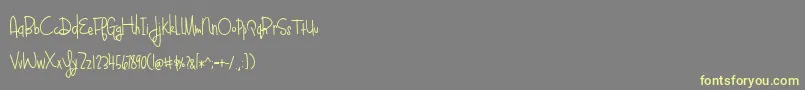 BlueberyOatmealBold Font – Yellow Fonts on Gray Background