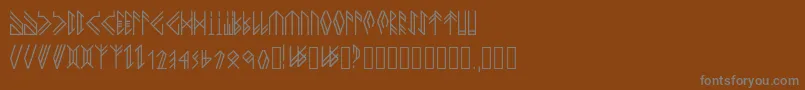 フォントNewhorkbook – 茶色の背景に灰色の文字