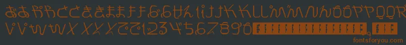 PrayForJapan-fontti – ruskeat fontit mustalla taustalla