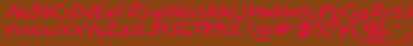 Czcionka Bunnigirlshandyoff – czerwone czcionki na brązowym tle
