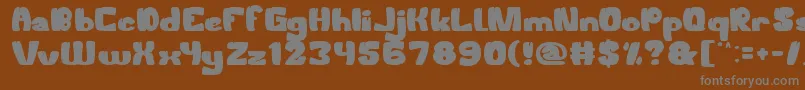 WelcomeToTheJungle Font – Gray Fonts on Brown Background