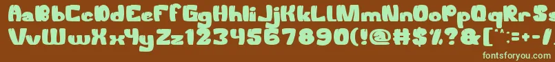 WelcomeToTheJungle Font – Green Fonts on Brown Background