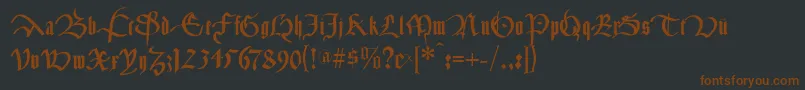 Шрифт Cancelleresca – коричневые шрифты на чёрном фоне