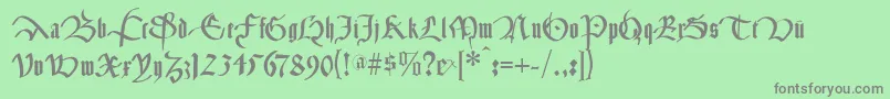 フォントCancelleresca – 緑の背景に灰色の文字