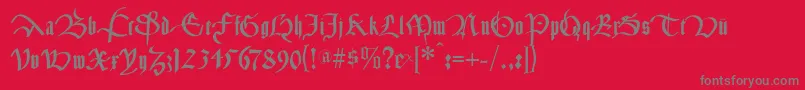 フォントCancelleresca – 赤い背景に灰色の文字