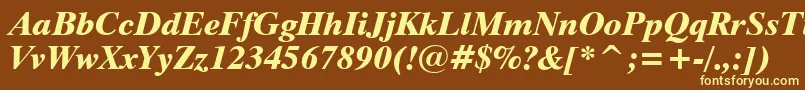 Dutch801ExtraBoldItalicBt-fontti – keltaiset fontit ruskealla taustalla