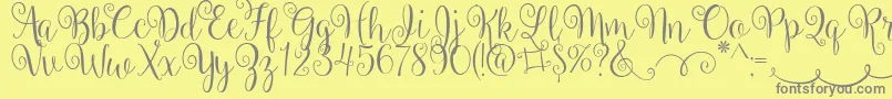 BallerinaScript-Schriftart – Graue Schriften auf gelbem Hintergrund