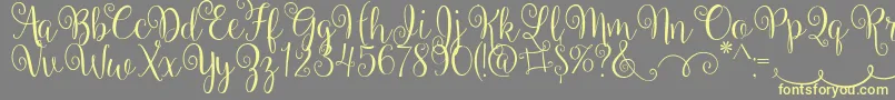 BallerinaScript Font – Yellow Fonts on Gray Background