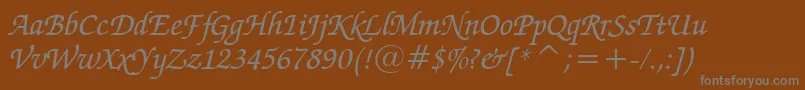 ZapfChanceryMediumItalicBt-fontti – harmaat kirjasimet ruskealla taustalla