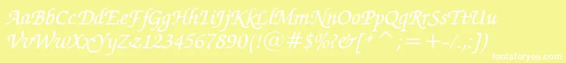 ZapfChanceryMediumItalicBt-fontti – valkoiset fontit keltaisella taustalla