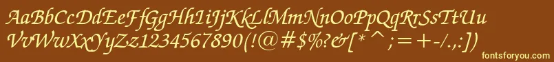 ZapfChanceryMediumItalicBt-fontti – keltaiset fontit ruskealla taustalla