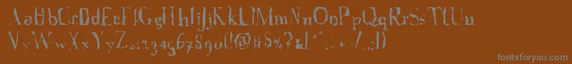 フォントAFontWithSerifsdisordered – 茶色の背景に灰色の文字