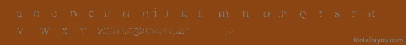 Czcionka AllUsedUp – szare czcionki na brązowym tle
