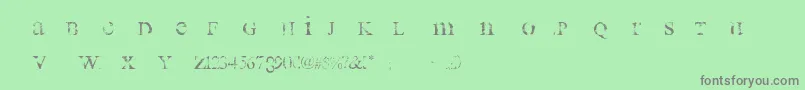 AllUsedUp-fontti – harmaat kirjasimet vihreällä taustalla