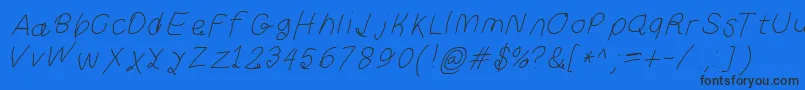 Curlykueita Font – Black Fonts on Blue Background