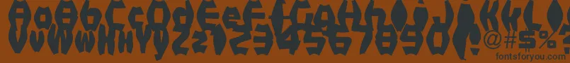 FatManIiBold Font – Black Fonts on Brown Background