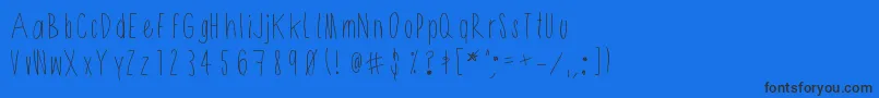 Shithead-Schriftart – Schwarze Schriften auf blauem Hintergrund