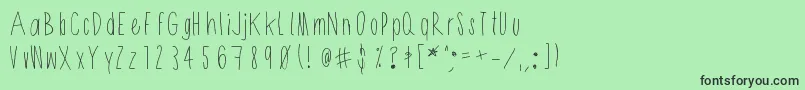 フォントShithead – 緑の背景に黒い文字