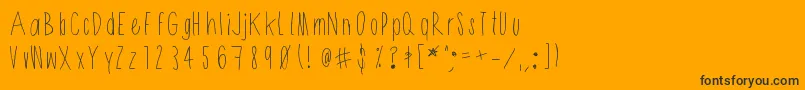Shithead-Schriftart – Schwarze Schriften auf orangefarbenem Hintergrund