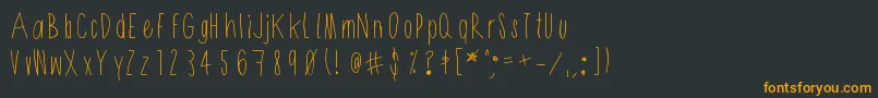 Shithead-Schriftart – Orangefarbene Schriften auf schwarzem Hintergrund