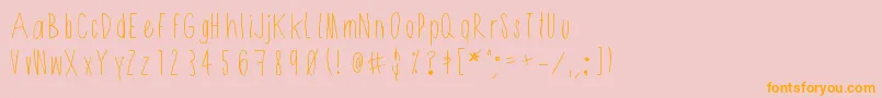 Shithead Font – Orange Fonts on Pink Background