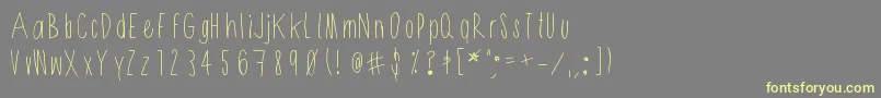 Shithead-fontti – keltaiset fontit harmaalla taustalla