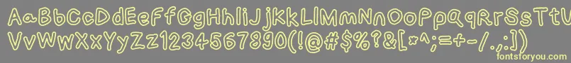 Loogiehawkotl Font – Yellow Fonts on Gray Background