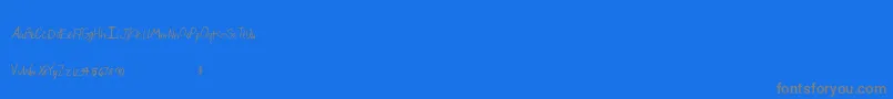 フォントBeautifulthangsab – 青い背景に灰色の文字