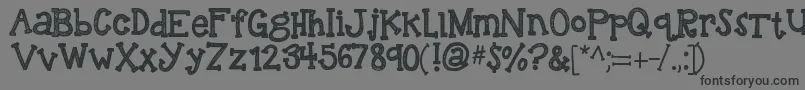 Kbreindeergames-Schriftart – Schwarze Schriften auf grauem Hintergrund