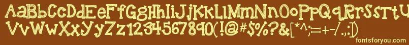 Kbreindeergames Font – Yellow Fonts on Brown Background