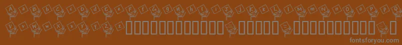Шрифт JackintheboxKg – серые шрифты на коричневом фоне