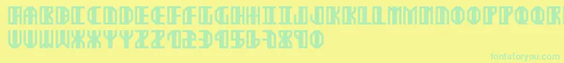 フォントEkster – 黄色い背景に緑の文字