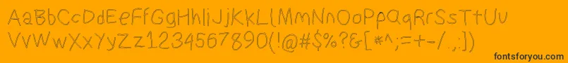 Suplexdriverregularol Font – Black Fonts on Orange Background