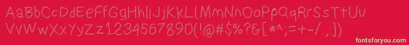 Suplexdriverregularol-Schriftart – Grüne Schriften auf rotem Hintergrund