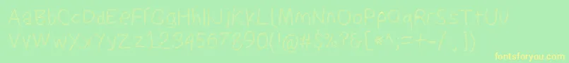 Suplexdriverregularol Font – Yellow Fonts on Green Background