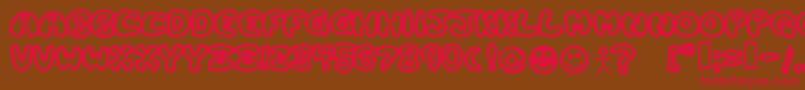 PlasticTomatoBold Font – Red Fonts on Brown Background