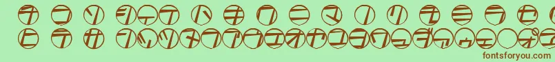 フォントTamioQn6 – 緑の背景に茶色のフォント