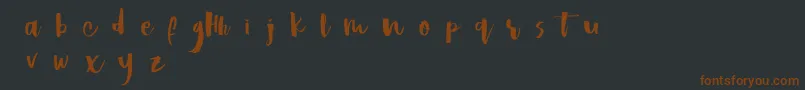 Hastagirldemo-fontti – ruskeat fontit mustalla taustalla
