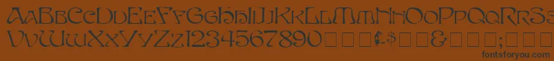 Eddacaps Font – Black Fonts on Brown Background